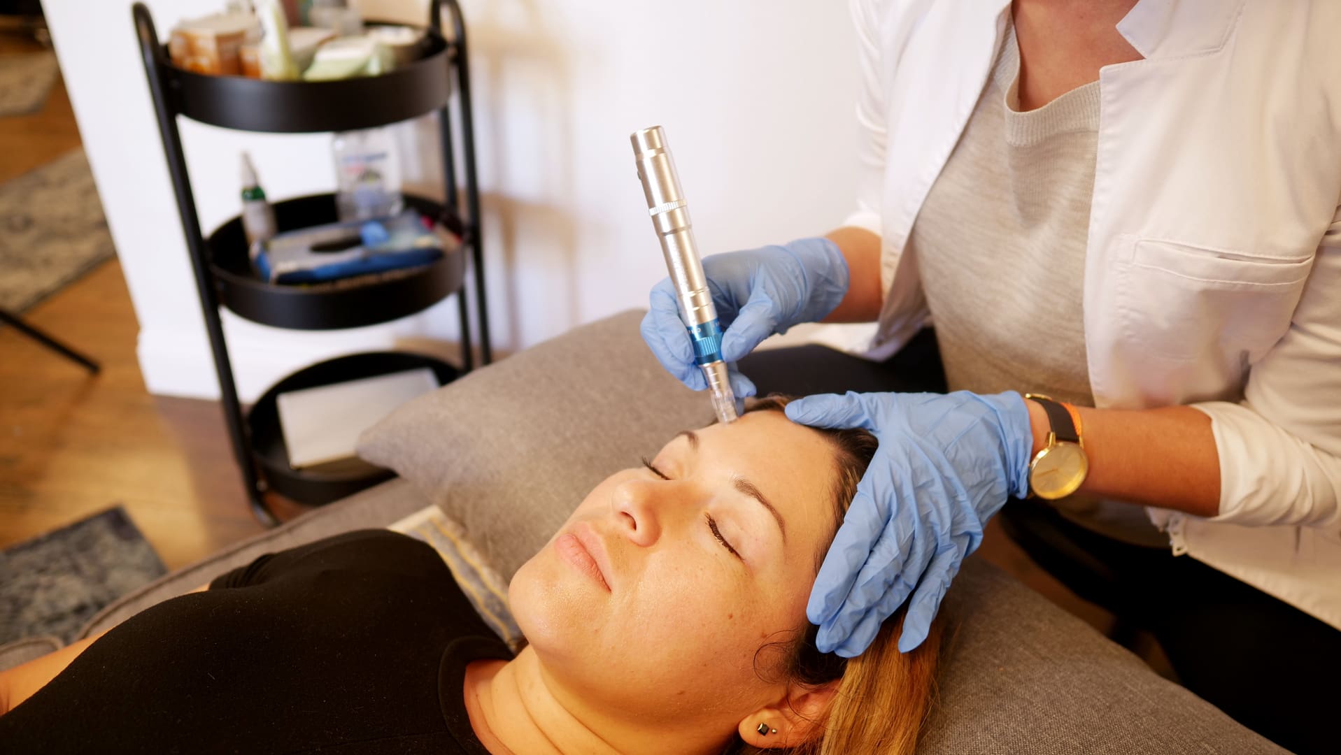 A woman getting her face microdermabrasion procedure.